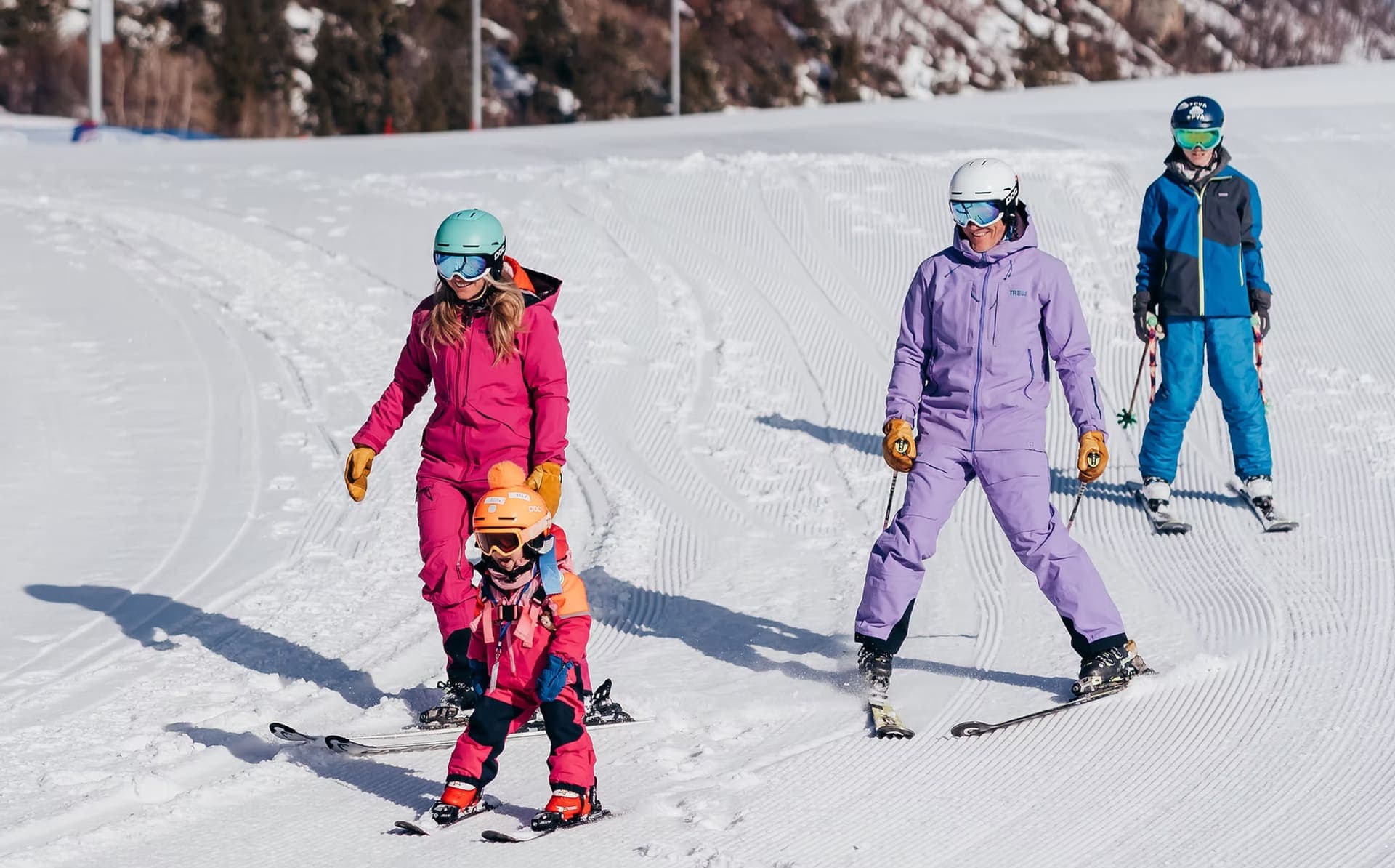 Family enjoying skiing in Colorado's Summit County mountains